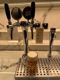A beer dispenser on a counter

AI-generated content may be incorrect.