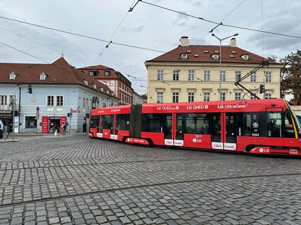A red bus on a street

AI-generated content may be incorrect.