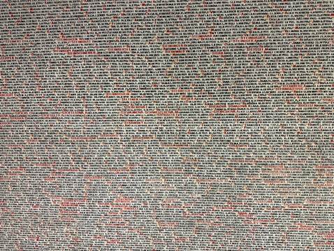 A wall with black and red bricks

AI-generated content may be incorrect.